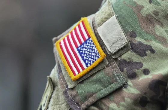 Army Patch on the sleeve of an American soldier.